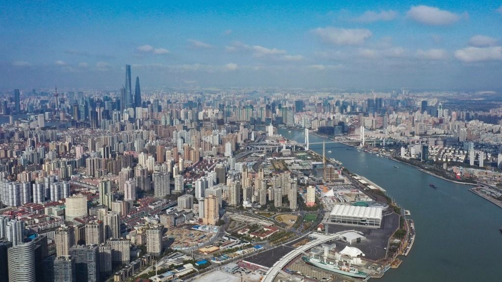 Aerial photos of city sceneries on both sides of Huangpu River in Shanghai
Aerial photos of the beautiful city sceneries on both sides of Huangpu River under blue sky in Shanghai, China, 25 February 2021. (Photo by Stringer / Imaginechina via AFP)