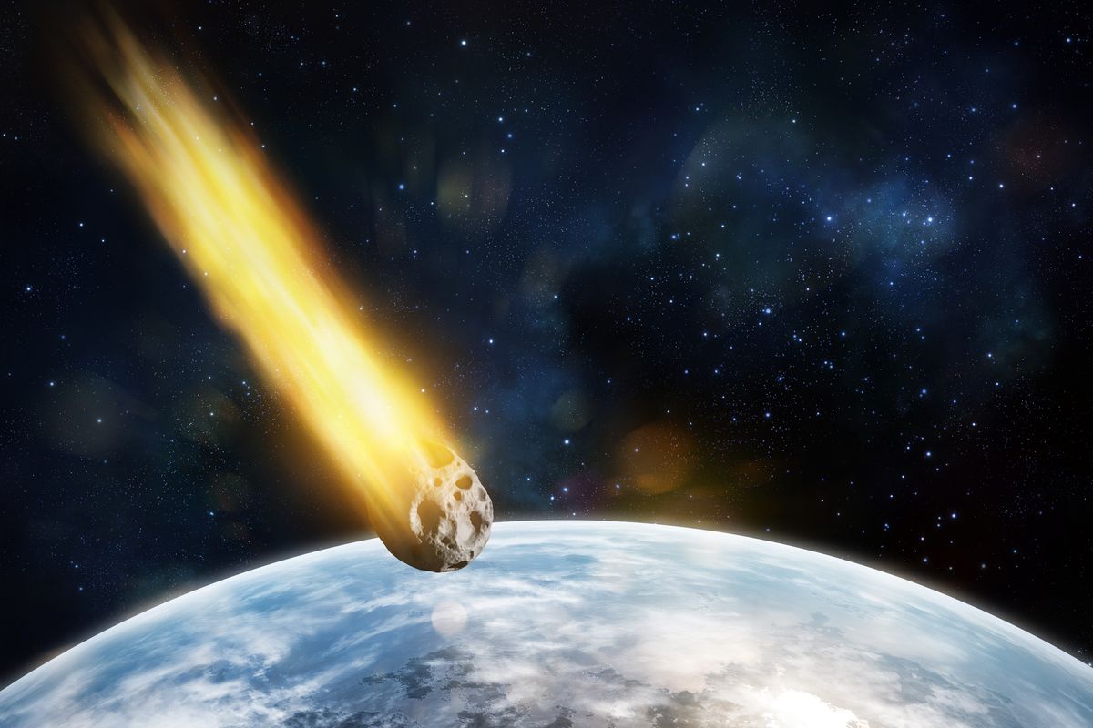 Asteroid entering blue`s planet atmosphere, meteor