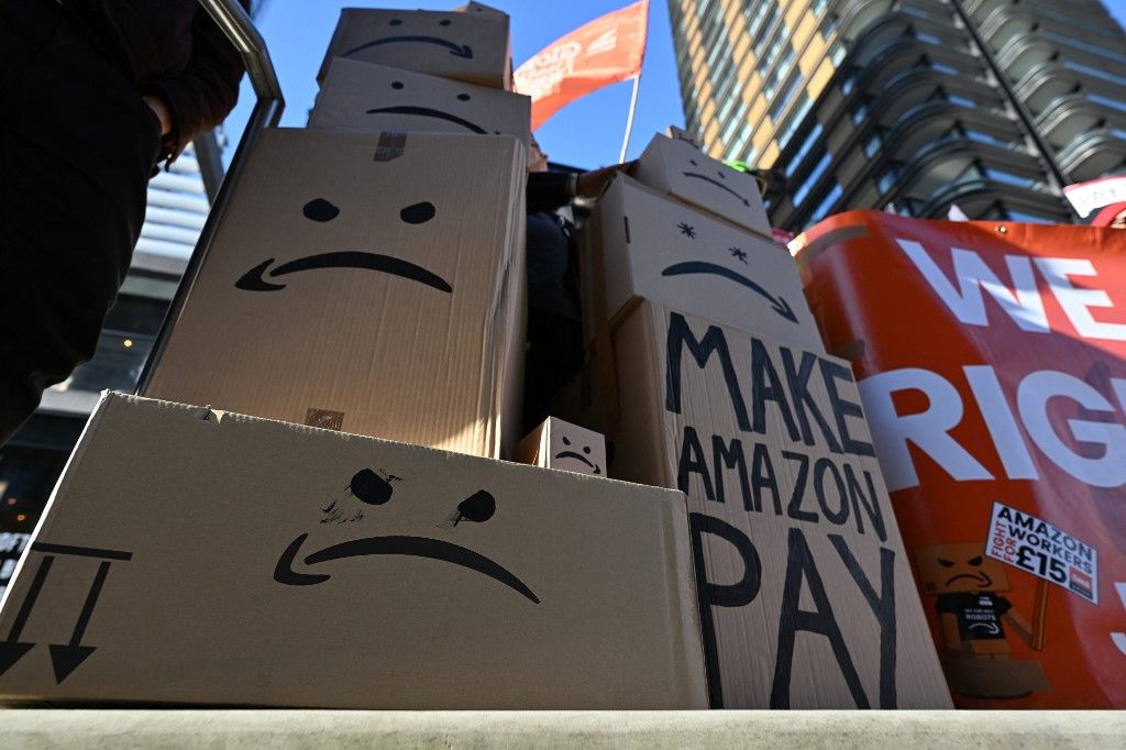 Amazon workers stage walkout and protest outside of Amazon HQ in London