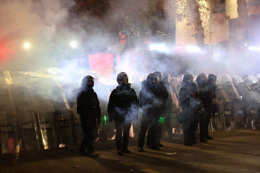 Police use water cannons against protesters surrounding Georgia’s parliament