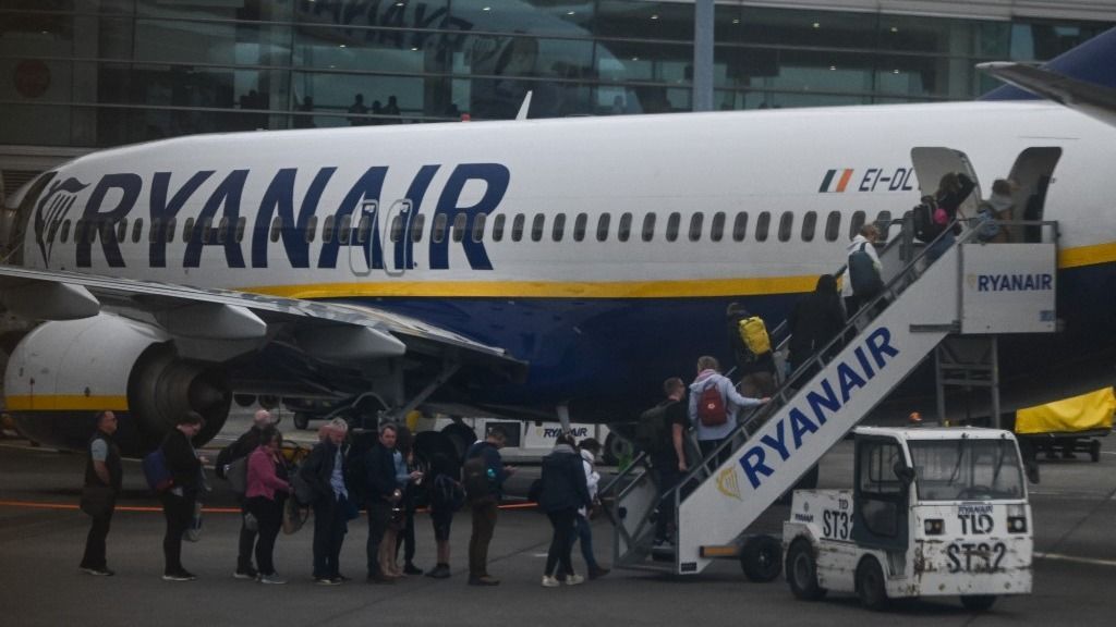 Ryanair DUBLIN, IRELAND - MAY 22: 
Passengers board a Ryanair plane at Dublin Airport, on May 22, 2024, in Dublin, Ireland. (Photo by Artur Widak/NurPhoto) (Photo by Artur Widak / NurPhoto / NurPhoto via AFP)