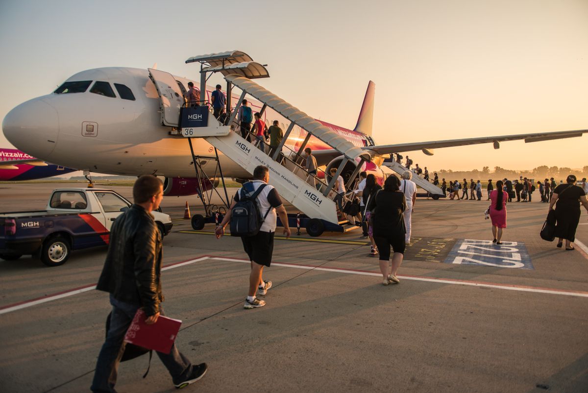Wizz Air Budapest,,Hungary,,August,4,2015,Passengers,Line,Up,For,Boarding