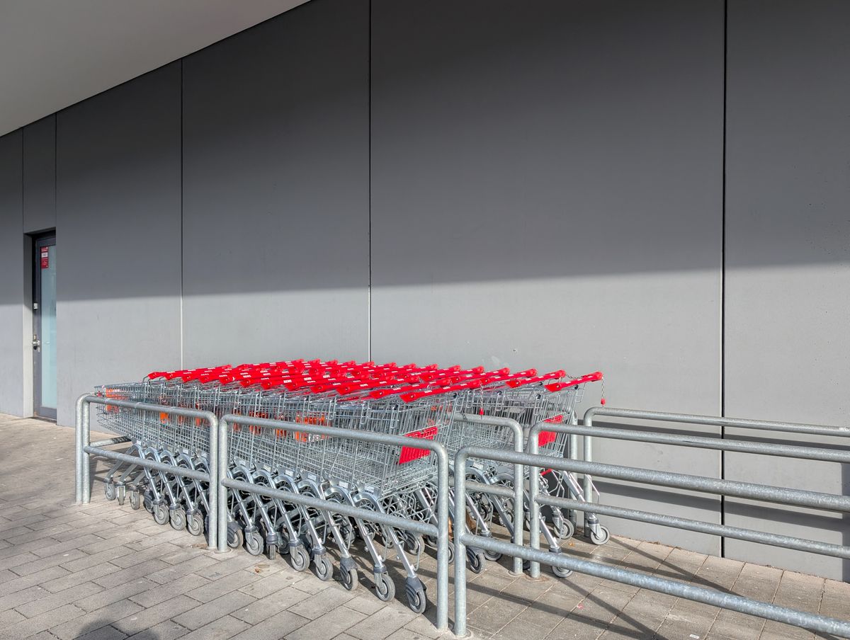 Stacked REWE Shopping Carts In Munich