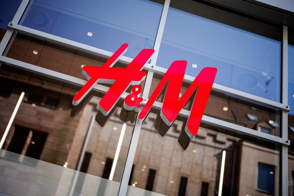 Logo of the fashion company H&M on a store