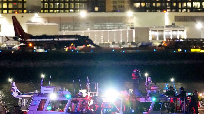 Emergency units search the Potomac River.