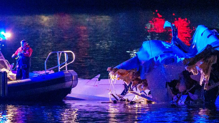 Emergency response teams assess wreckage in the Potomac River on Jan. 30.