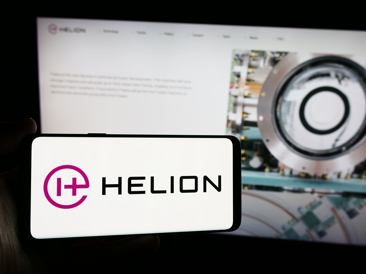 Stuttgart,,Germany,-,06-03-2024:,Person,Holding,Smartphone,With,Logo,Of, helion