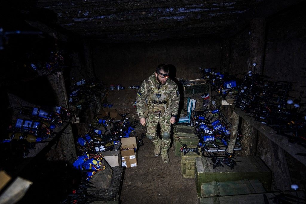 Ukrainian soldiers operate an FPV attack drone in the Kharkiv region