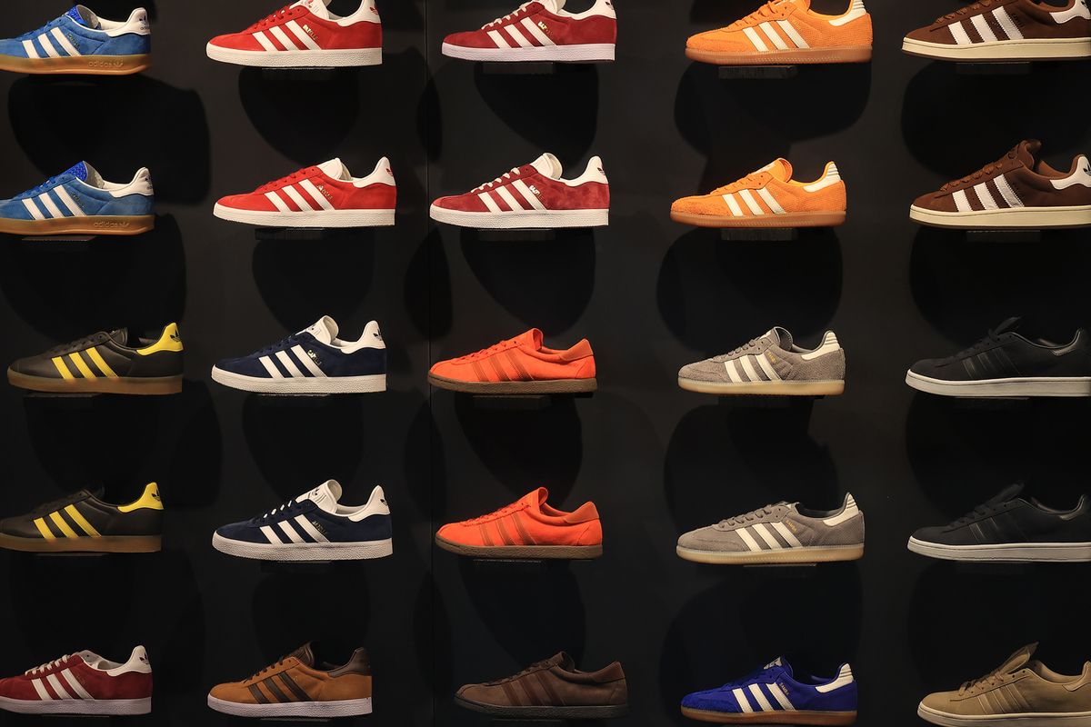 Adidas AG Stores as Sports Brand Slash Profitability Forecast