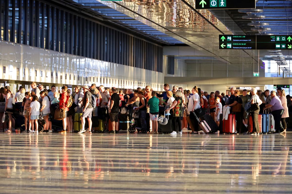 Dalaman,,Turkey?,-?,July,2022:,Tourists,Standing,With,Luggage,In