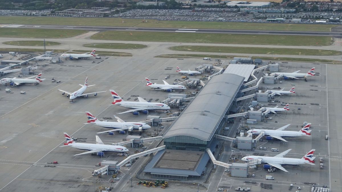 British,Airways,Airplanes,Sit,At,Terminal,Gates,On,The,Tarmac heathrow