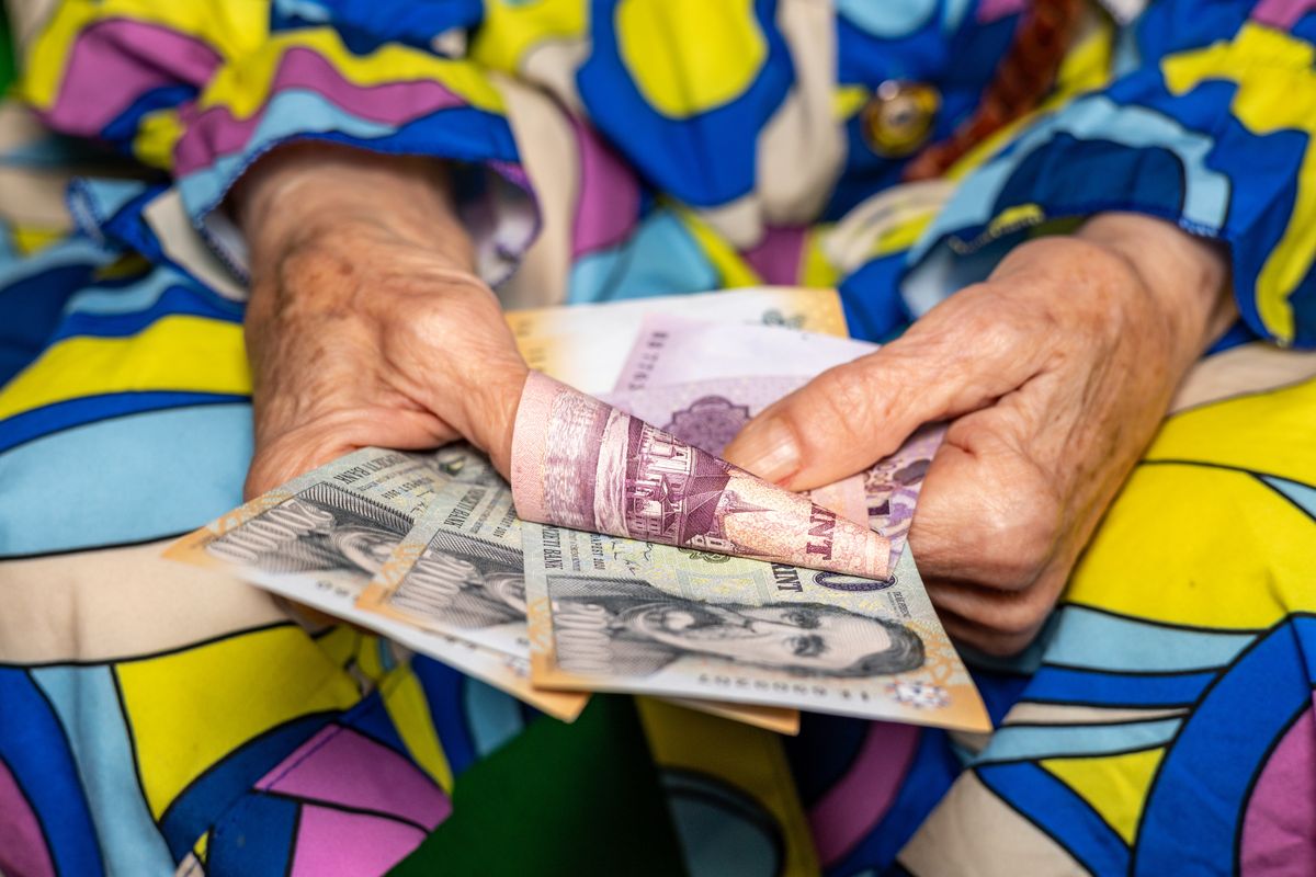 Pensioner's,Finances.,An,Old,Lady,Counts,Hungarian,Money,,Pension,In