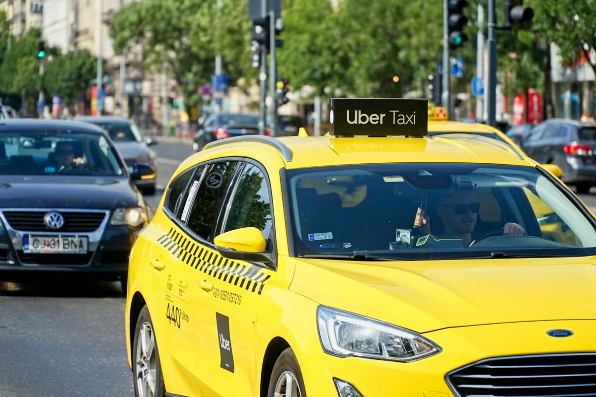 Budapest,,Hungary,-,July,7,,2024:,Yellow,Ford, Uber ,Taxi