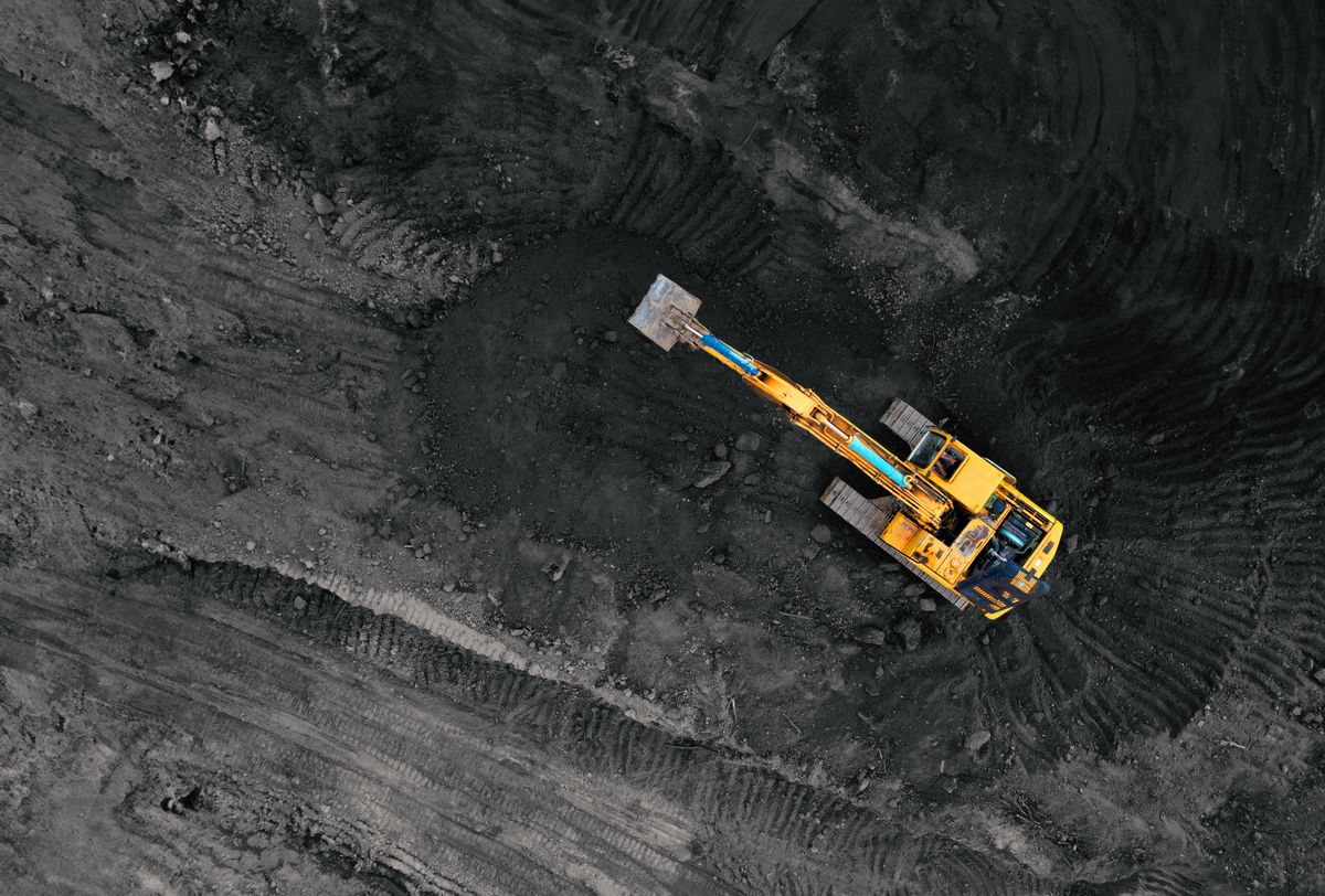 Coal,Mining,In,An,Open,Pit.,Mining,Excavator,Loads,Coal