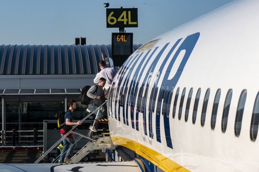 Passengers Boarding A Ryanair Aircraft Of The Low Cost Carrier