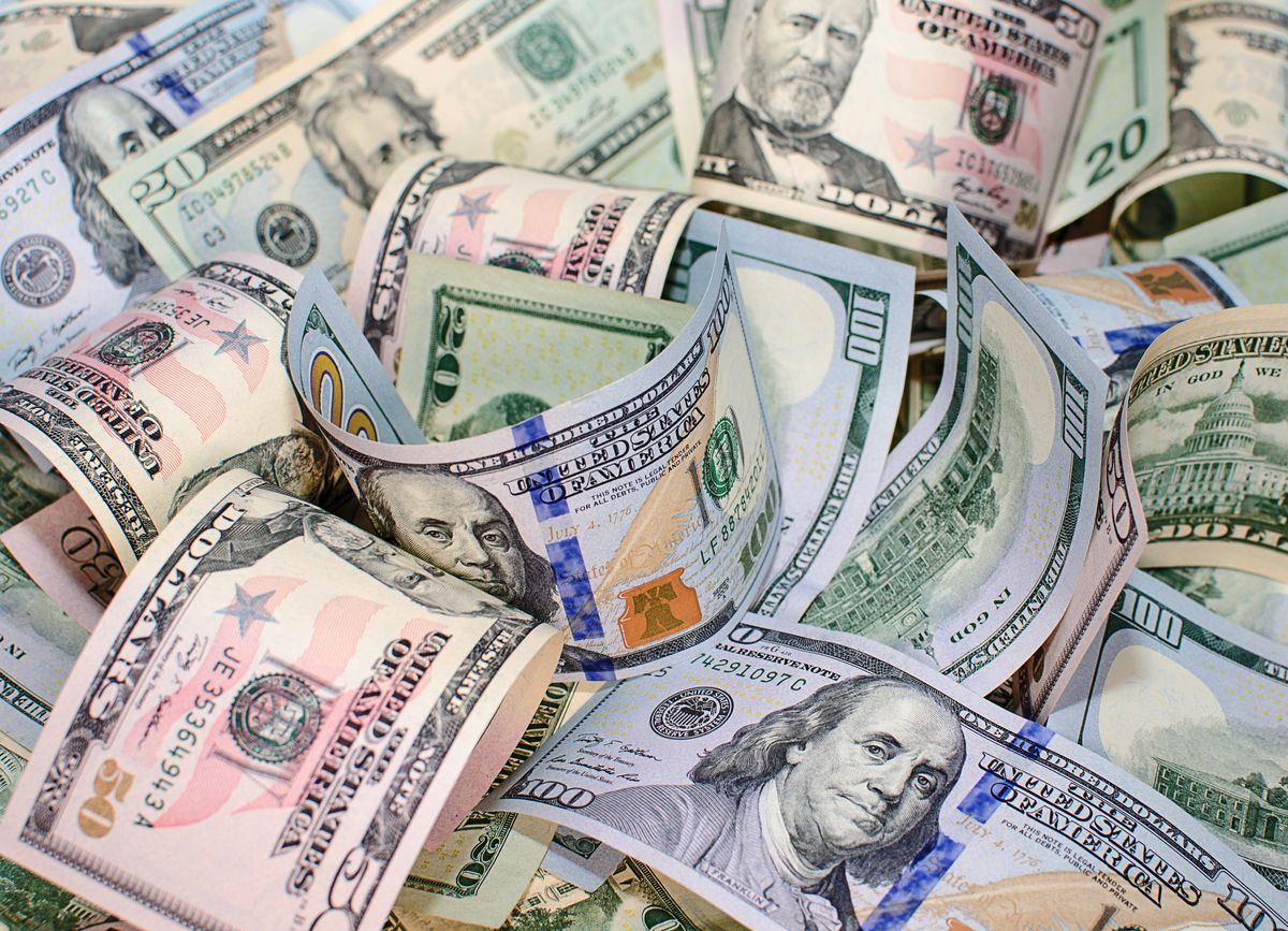 Background,Of,Twisted,Pile,Of,Dollar,Bills jelzáloghitel kamata USA