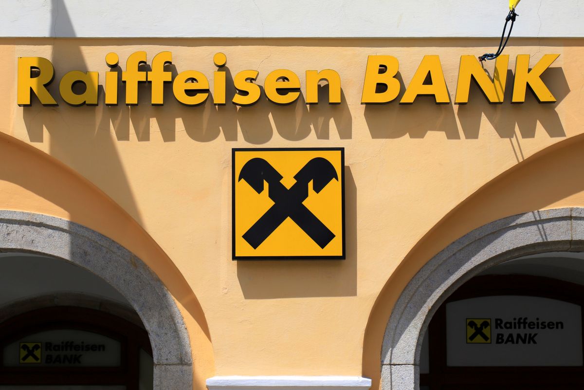 Raiffeisen,Bank,In,Medieval,Town.,Signboard,And,Flags,Large,International