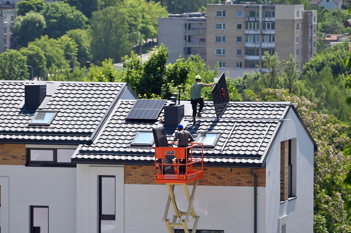 Vilnius,,Lithuania,-,June,07,,2023:,People,Installing,Solar,Panels