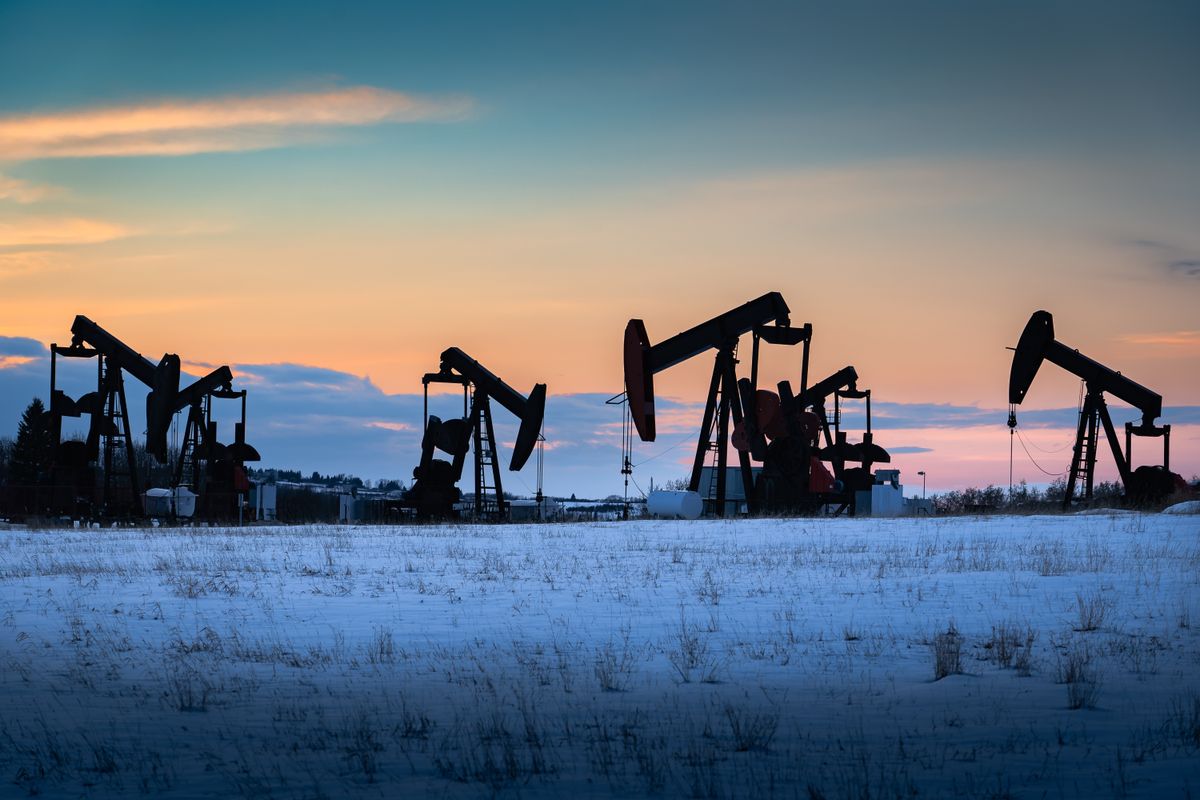 Oil,And,Gas,Pump,Jacks,Working,On,A,Snow,Covered, mol
