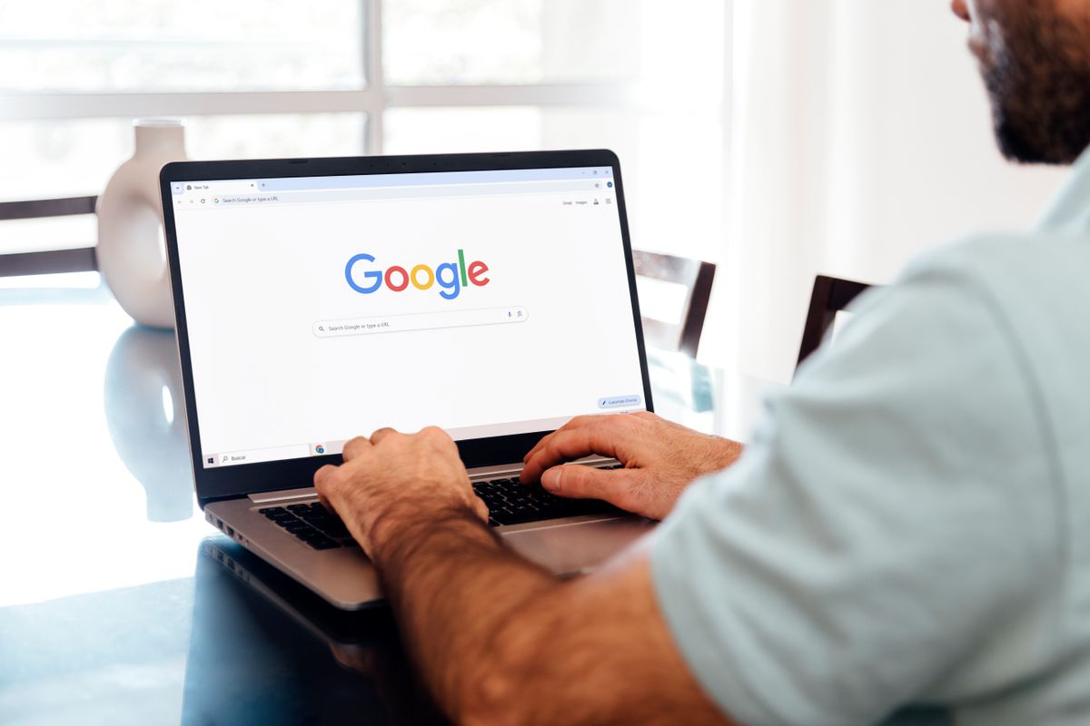 Google,Search,Engine,On,A,Laptop,Screen.,Man,Searching,In