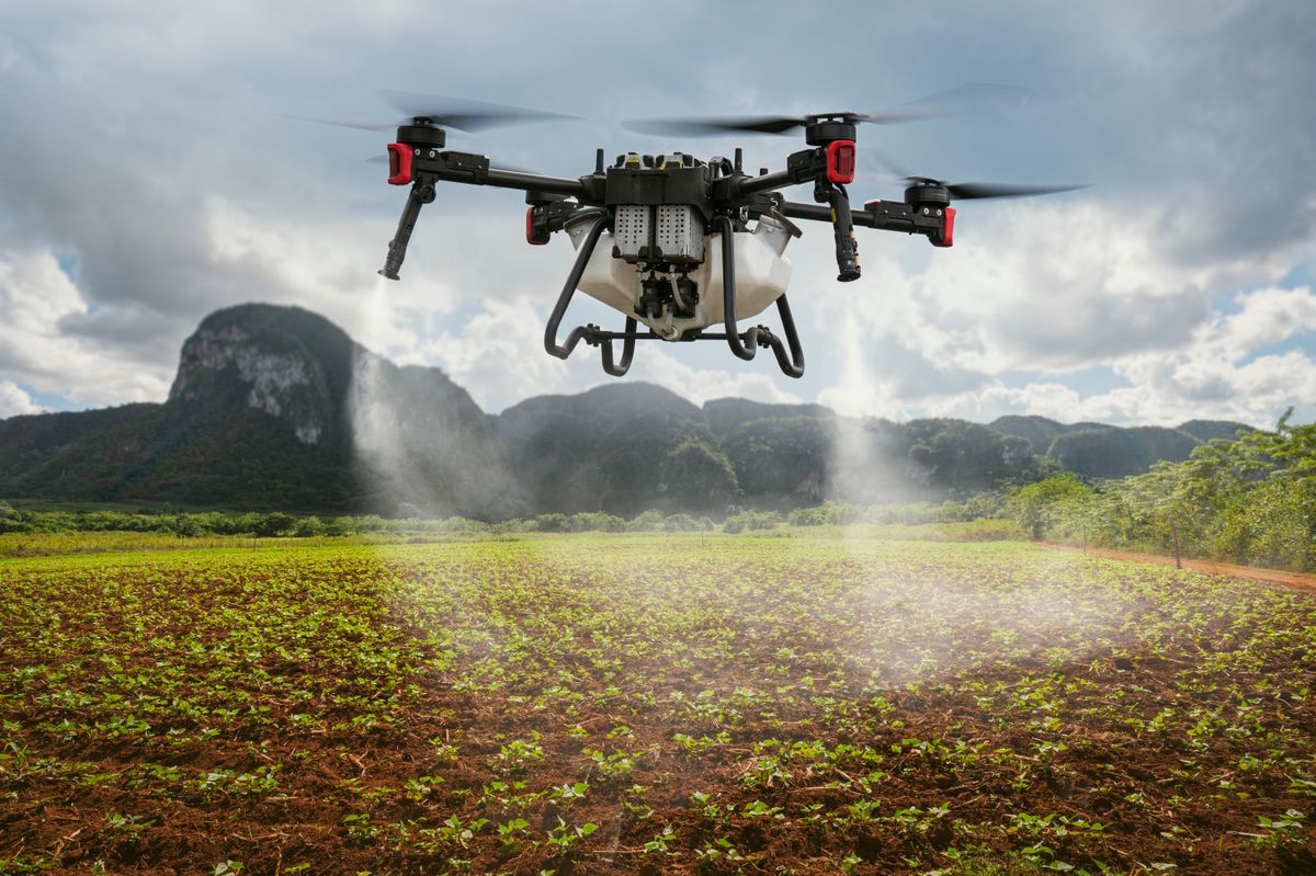 dróm, An,Industrial,Drone,On,Green,Field.,Sprays,Useful,Pesticides,To