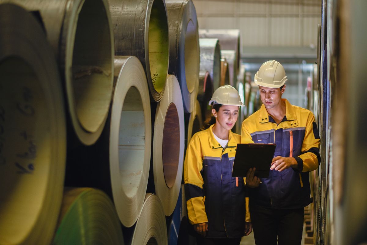 Two,Young,Engineer,Assistant,In,Helmet,Inspection,Check,Heavy,Machine