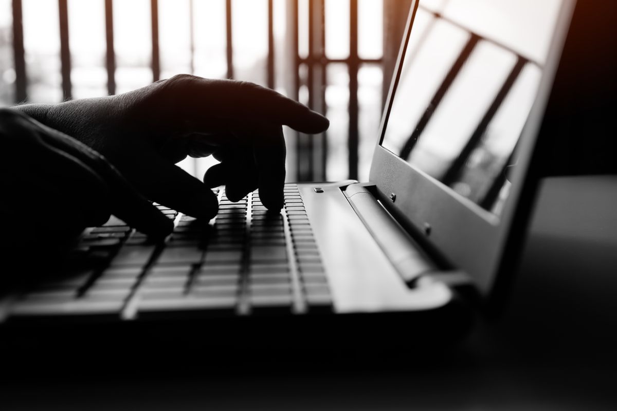 A Signify Hungary tolna vármegyei gyár bezár Cyber,Crime,Attack,On,Bank,,Cybercrime,Reaching,Through,Laptop,Computer,