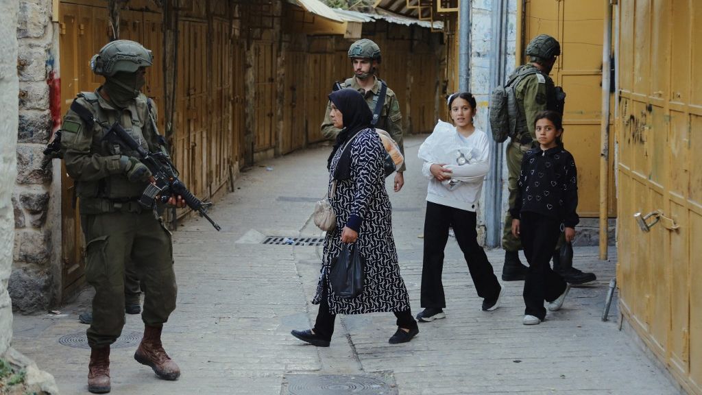 Israeli Forces Guard Settler Movement amerikai-izraeli gázai offenzíva