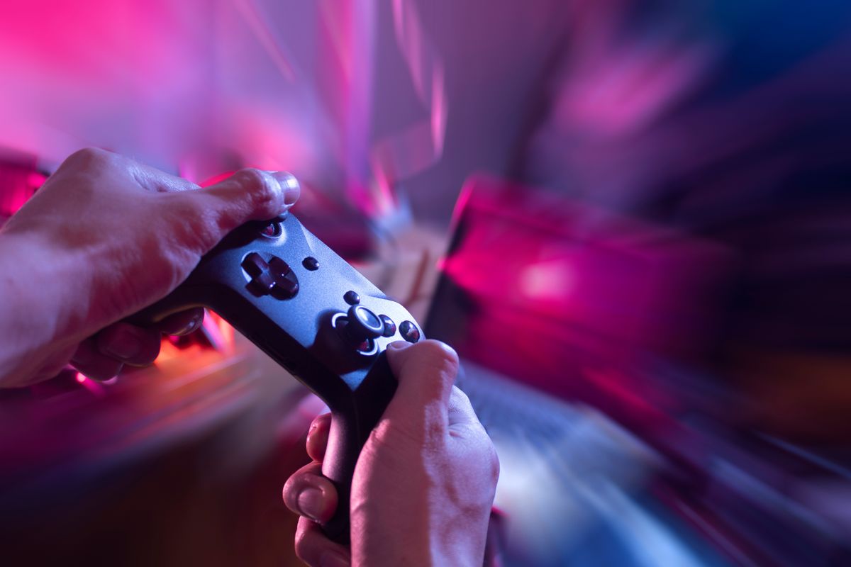 Gamer,Playing,Game,By,Joystick,With,Computer,,Gaming,And,Esports