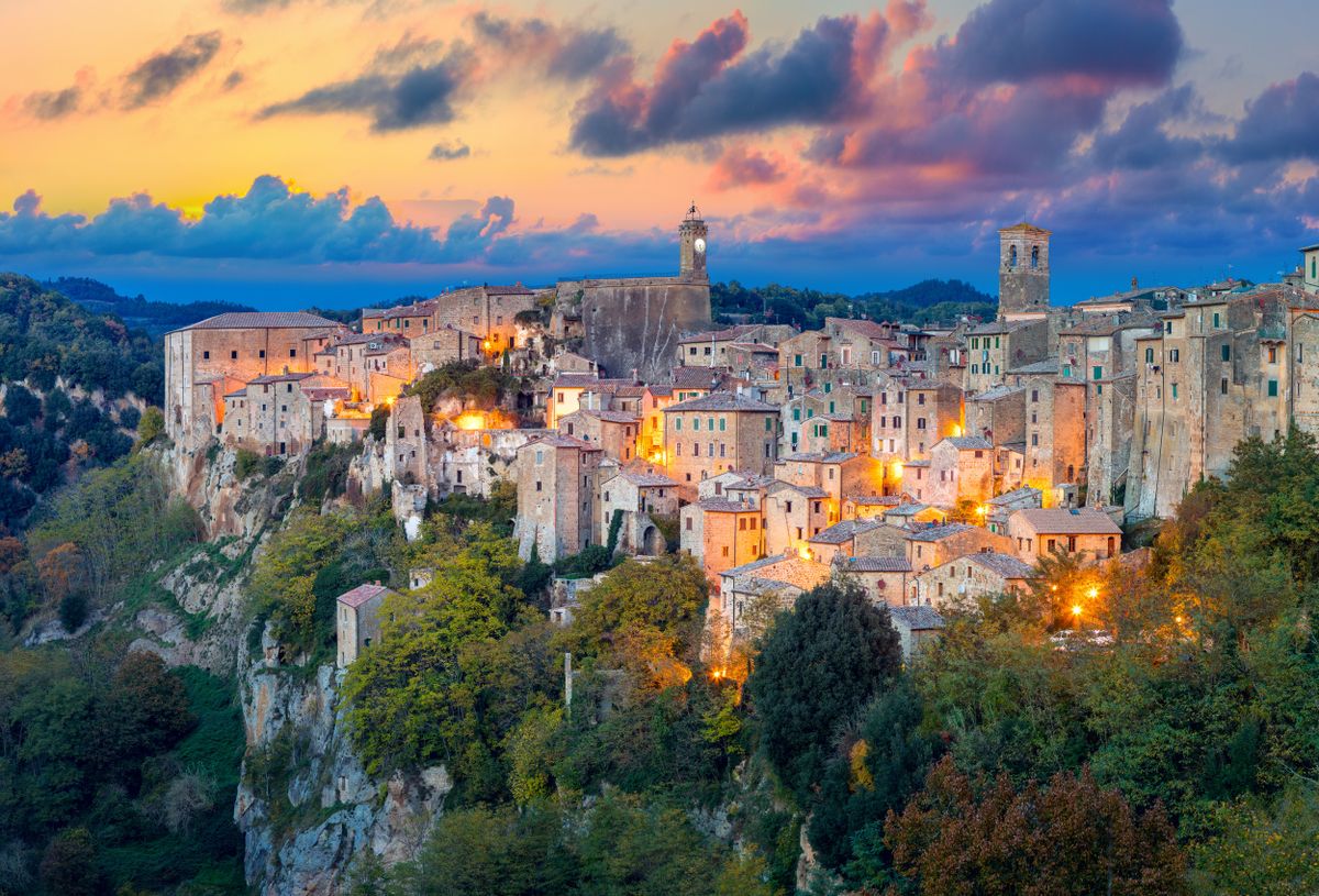 Panoramic,View,Of,Sorano,In,The,Evening,Sunset,With,Old