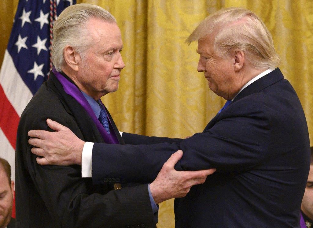 Trump honors  medal to arts and entertainment figures, including author James Paterson and actor Jon Voigt