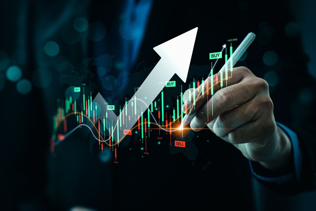Businessman,Drawing,Upward,Arrow,On,Digital,Stock,Market,Graph,With