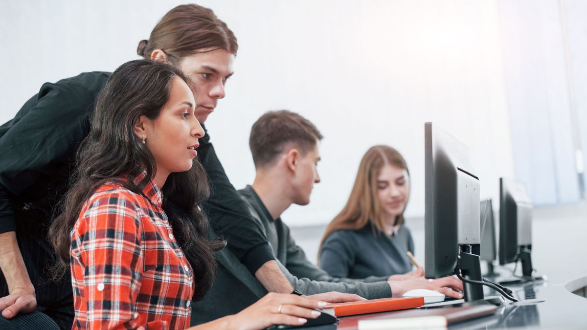 Here's my results. Group of young people in casual clothes working in the modern office amerikai startup