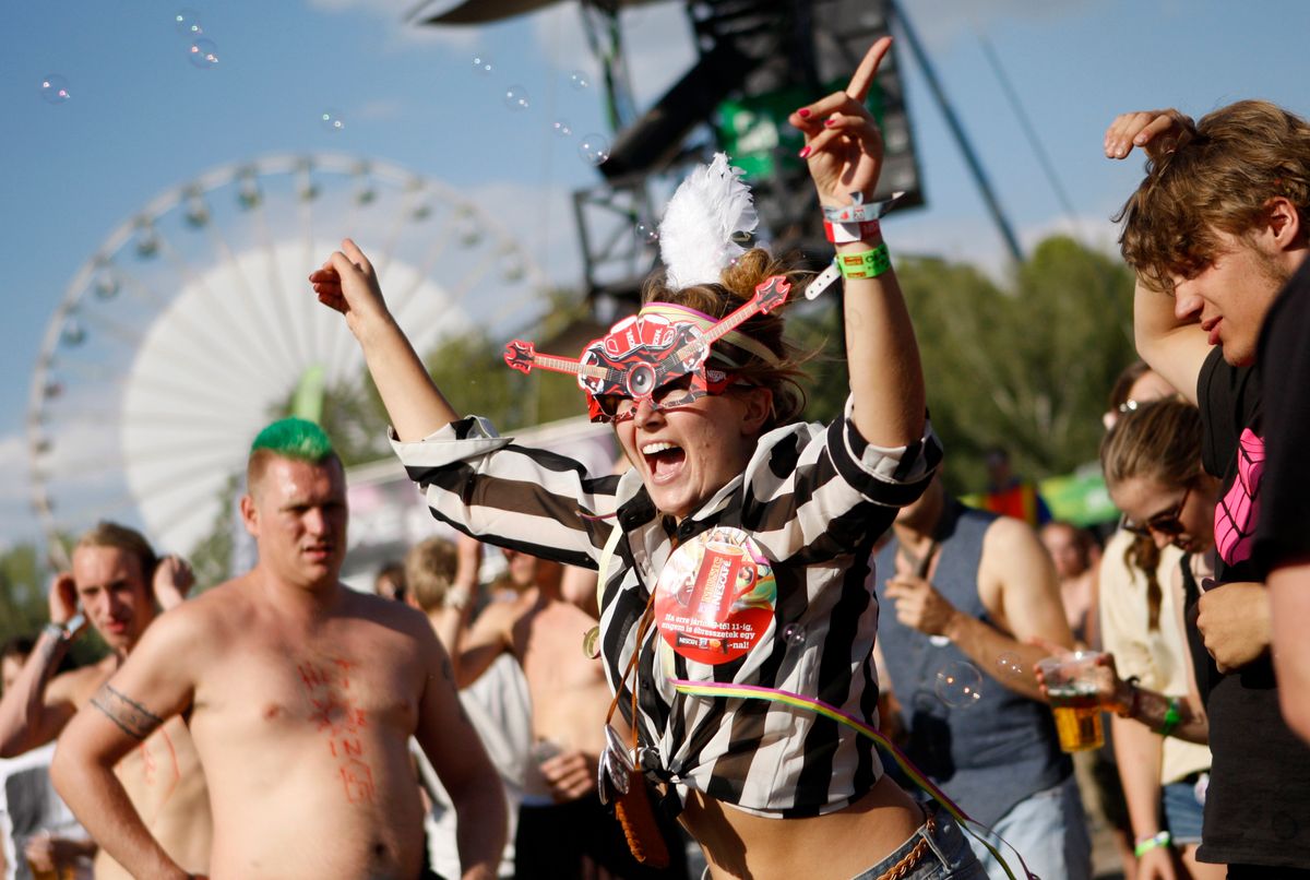 Festival goer enjoys concert by The Vaccines during Budapest's Sziget music festival