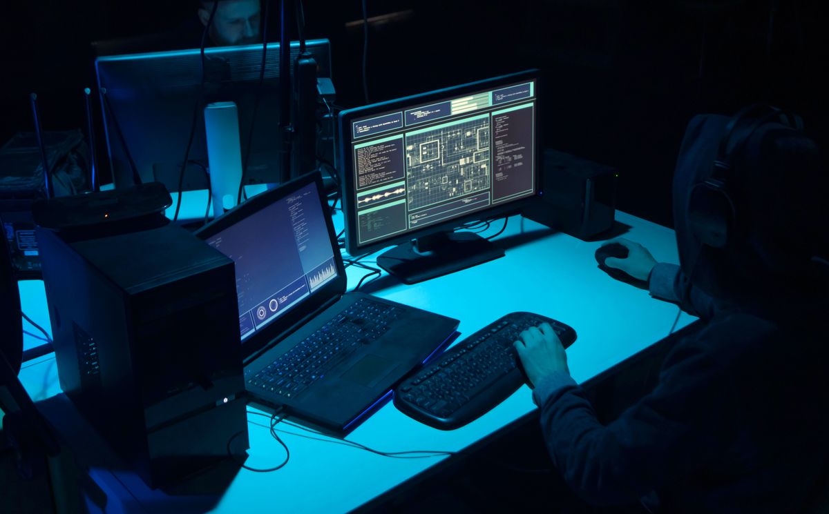 Hackers,Breaking,Server,Using,Multiple,Computers,And,Infected,Virus,Ransomware.