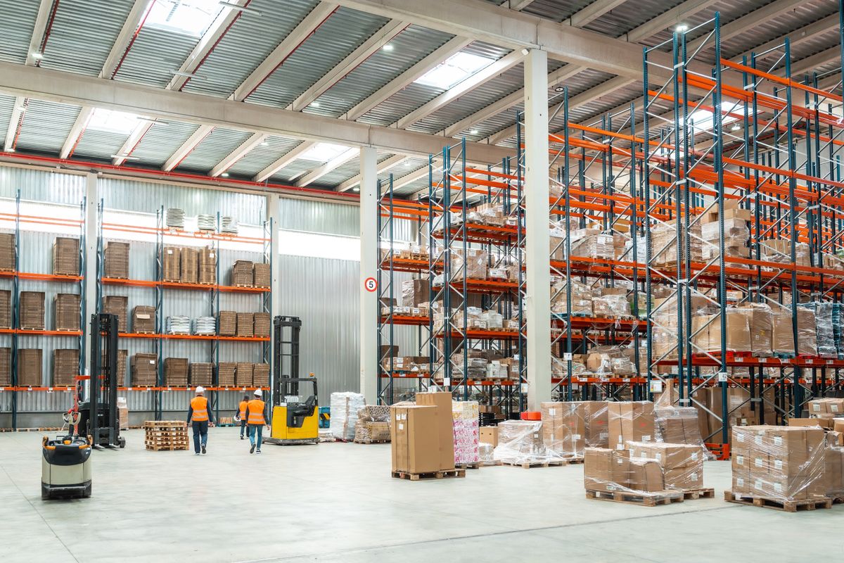 Warehouse,Workers,Are,Managing,Logistics,,Operating,Forklifts,,And,Organizing,Packages