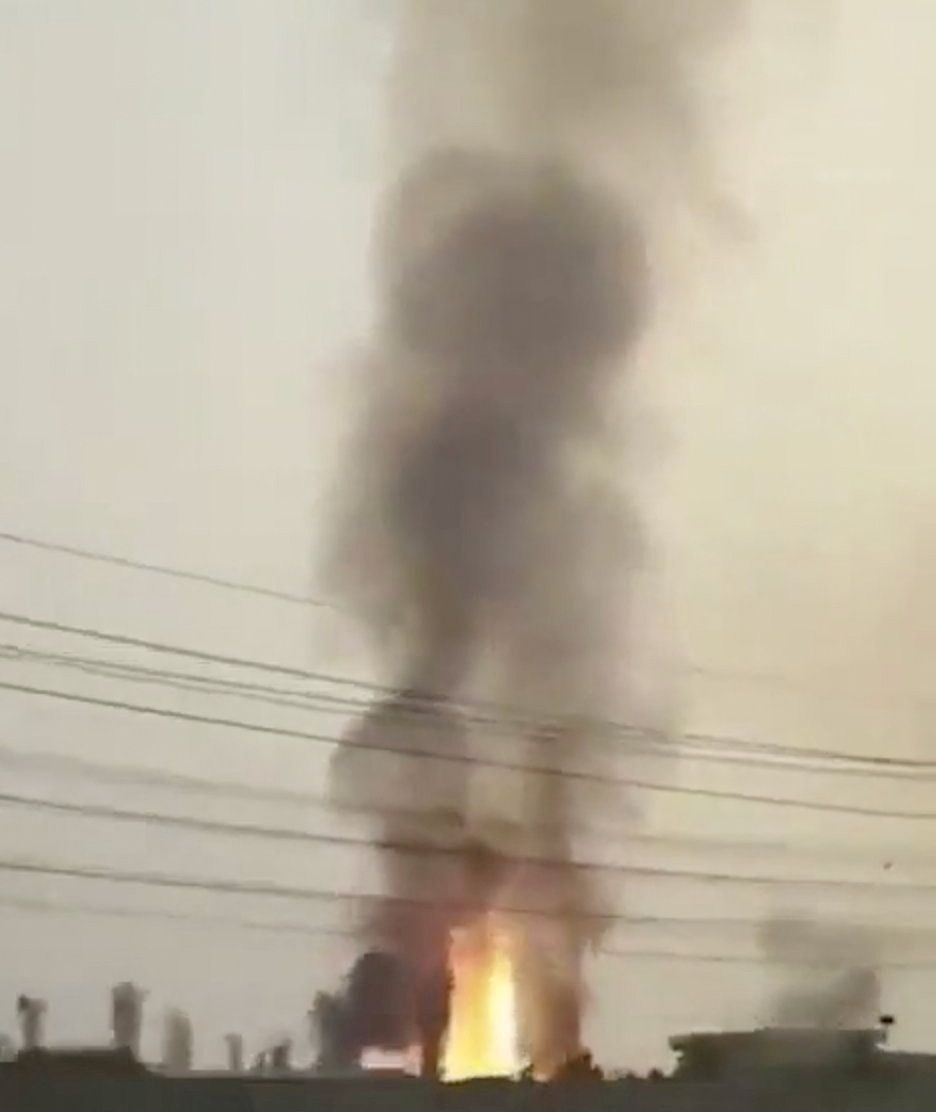 A fire burns at South Pars gas field, in Tonbak