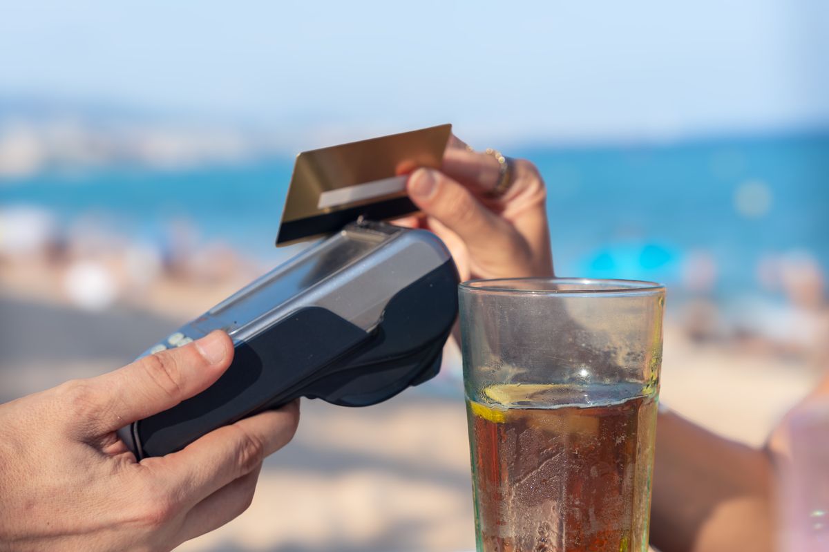 Unrecognizable,Man,Customer,Paying,With,Contactless,Credit,Card,In,A