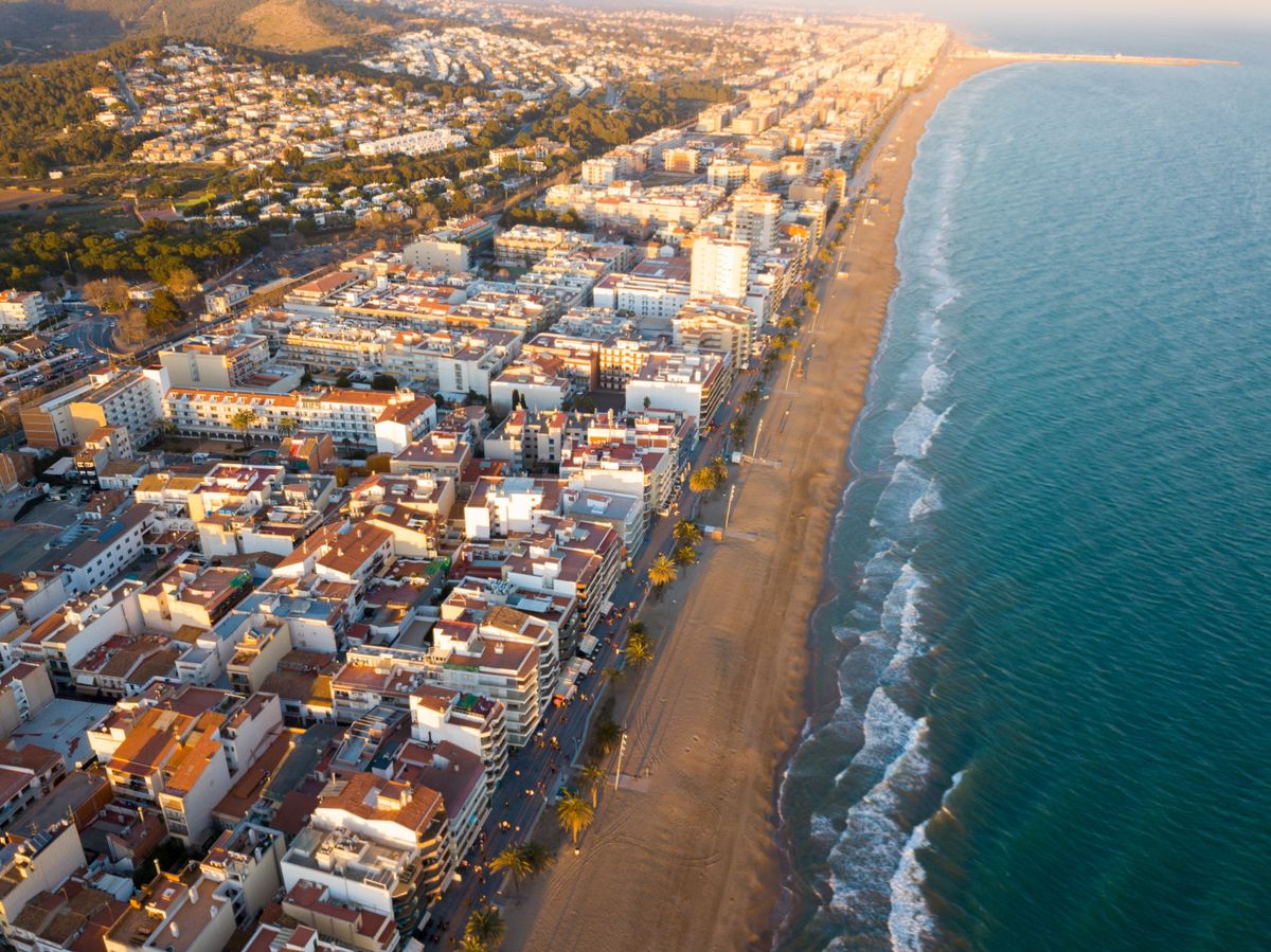 Aerial,View,Of,Coast,At,Calafell,Cityscape,With,A,Modern