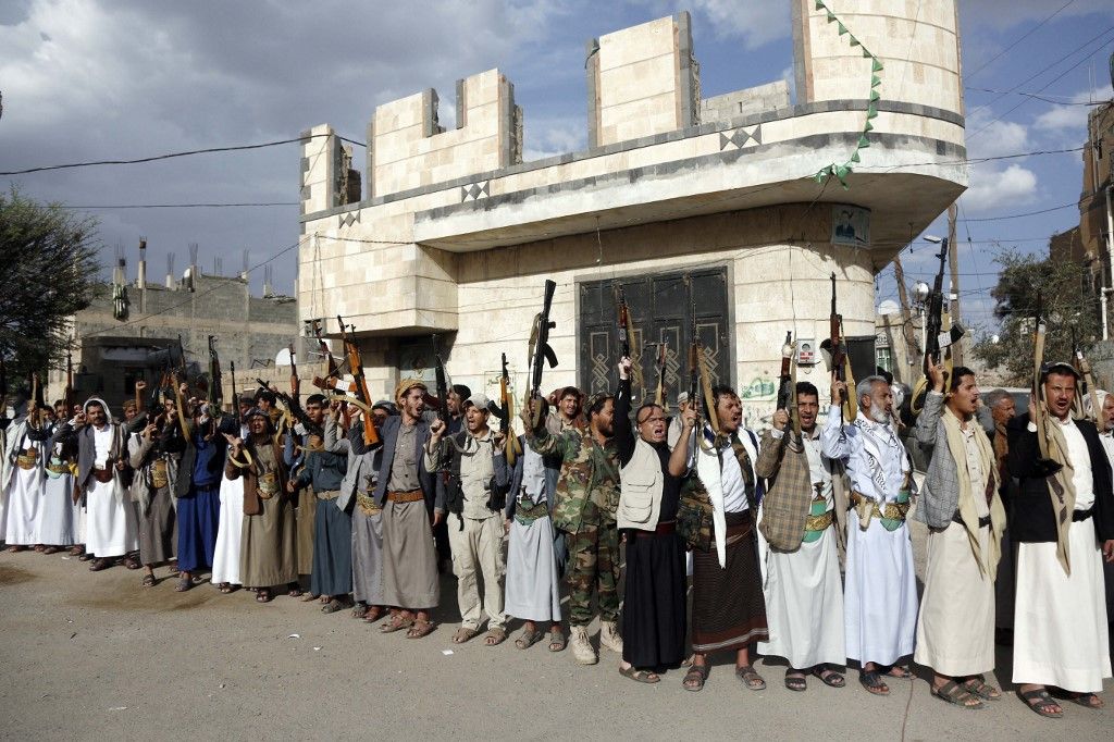 Houthi supporters demonstrate against the US and Israel