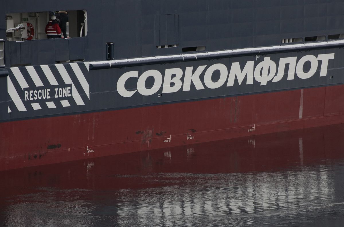 FILE PHOTO: The logo of Russian state shipping company Sovcomflot is seen on the multifunctional icebreaking standby vessel "Yevgeny Primakov" moored in central St. Petersburg