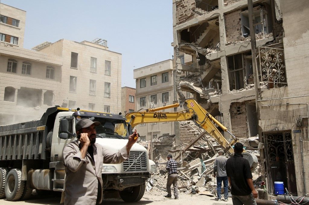 Israeli airstrikes on a civilian residential area cause damage to the buildings in Tehran