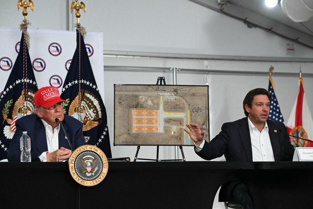 US President President Donald Trump visits a detention center located in the Florida Everglades
