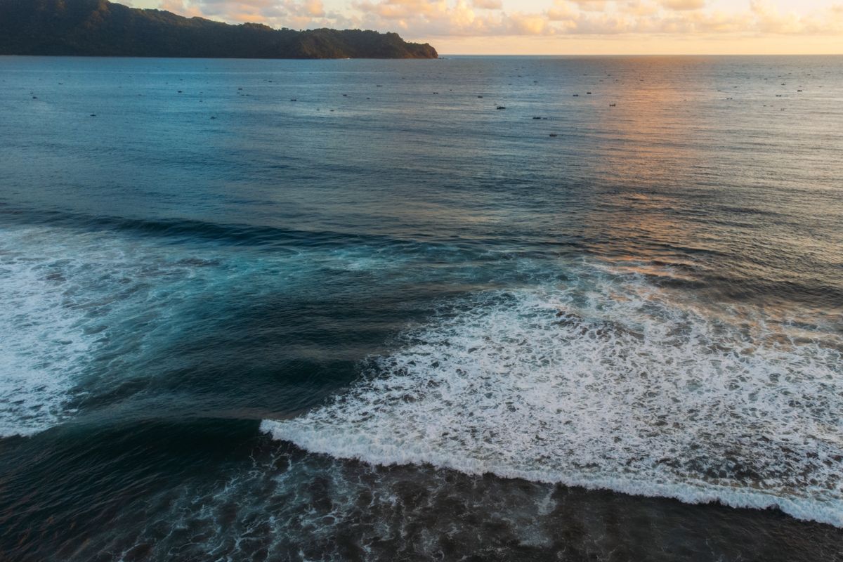 Drone,View,Of,Ocean,Rip,Current,,Beach,With,Waves,In