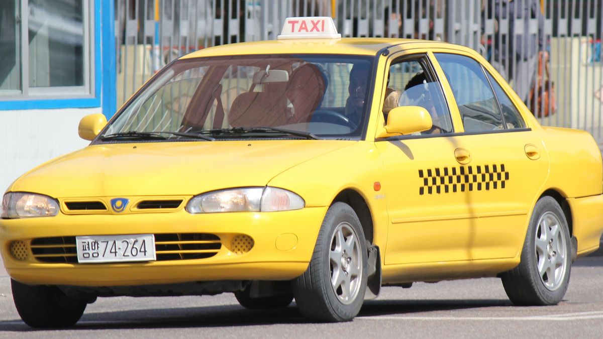 Taxik Észak-Koreában, Phenjanban (2011-es felvétel), észak-korea