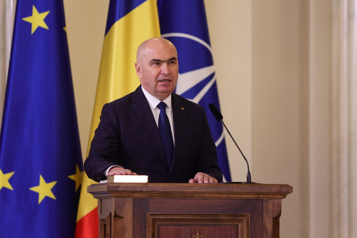 Romania's Prime Minister Bolojan speaks during a swearing in ceremony in Bucharest
