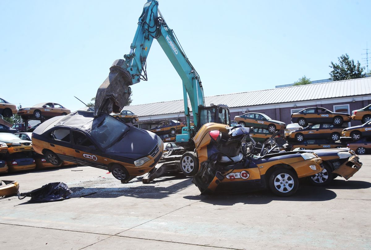 180 counterfeit taxis destroyed in Beijing
