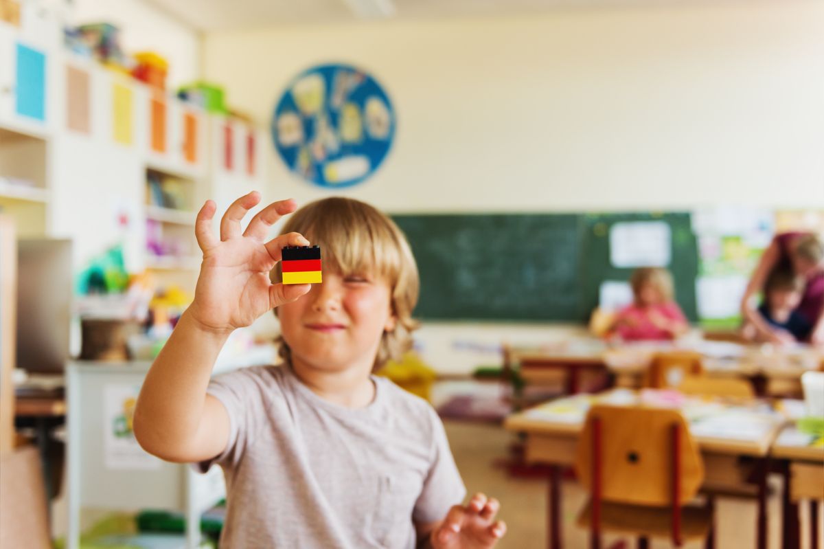 Cute,Little,Boy,Working,In,Classroom,,Holding,Self,Made,German Iszlám vallásoktatást követel a német oktatási és nevelési szövetség