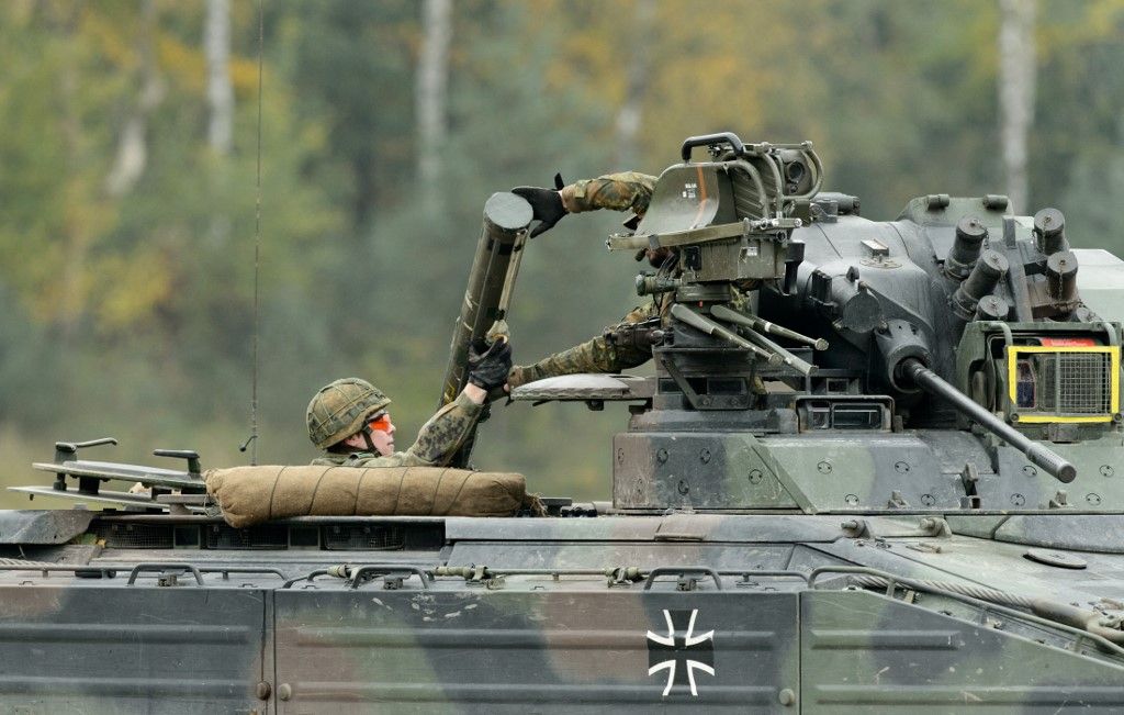 German armed forces practice operations on land