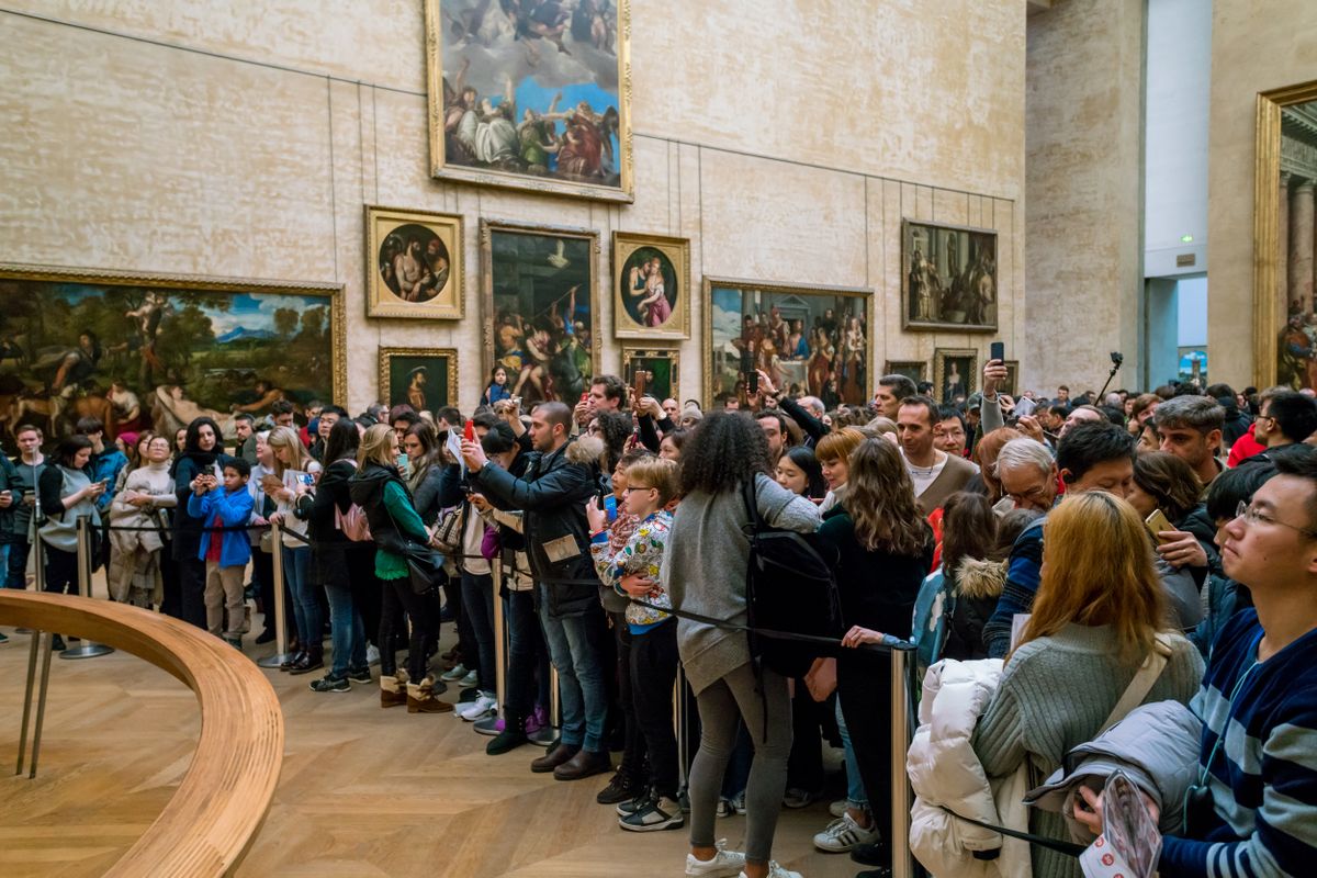 Paris,,France,-Louvre.Macron,February,15,,2018:,Visitors,Take,Photo,Of